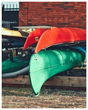 A row of canoes sitting next to each other