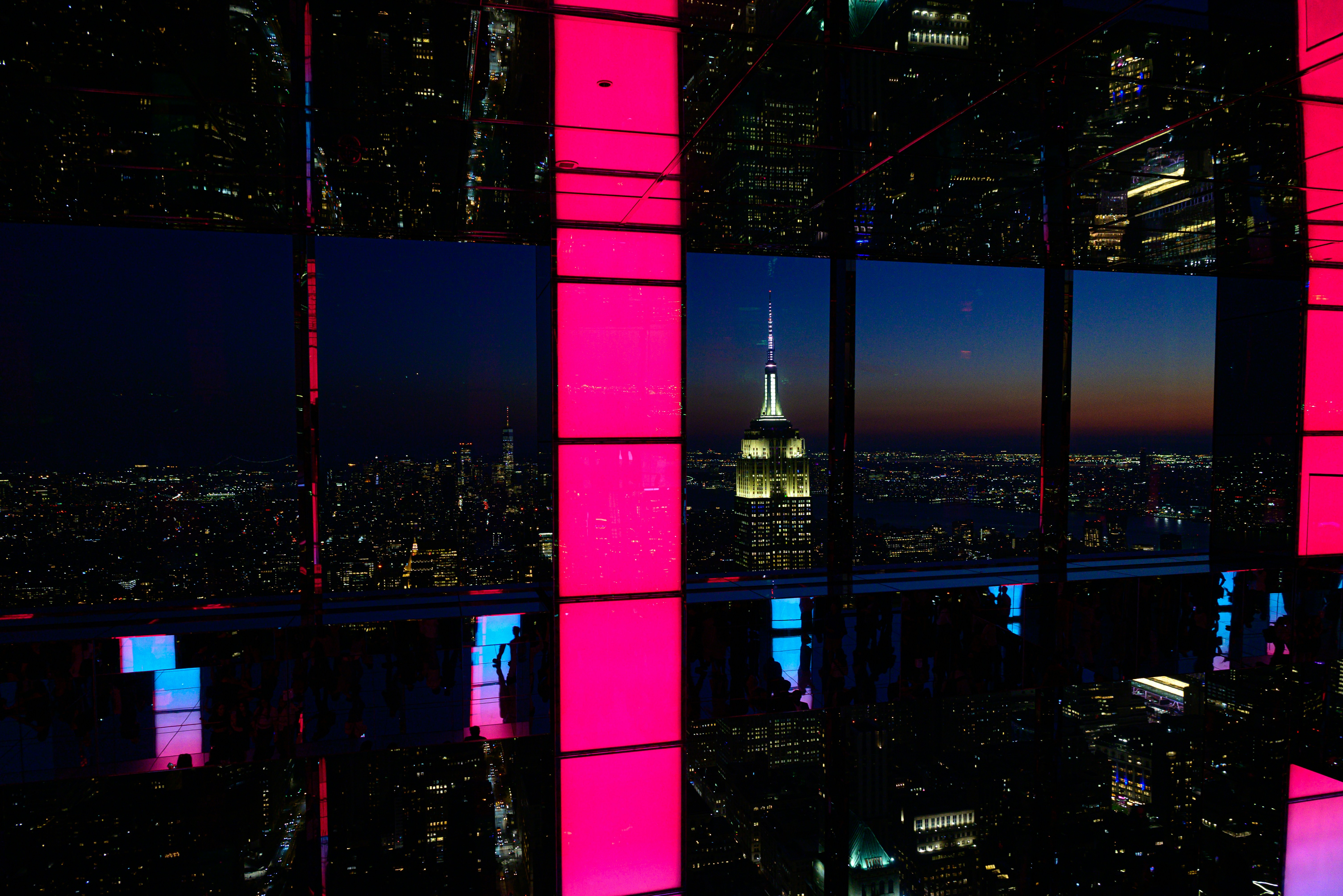 A window view of a city at night