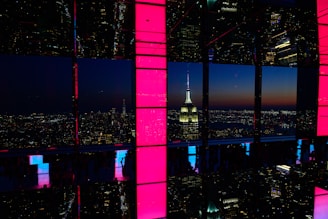 A window view of a city at night