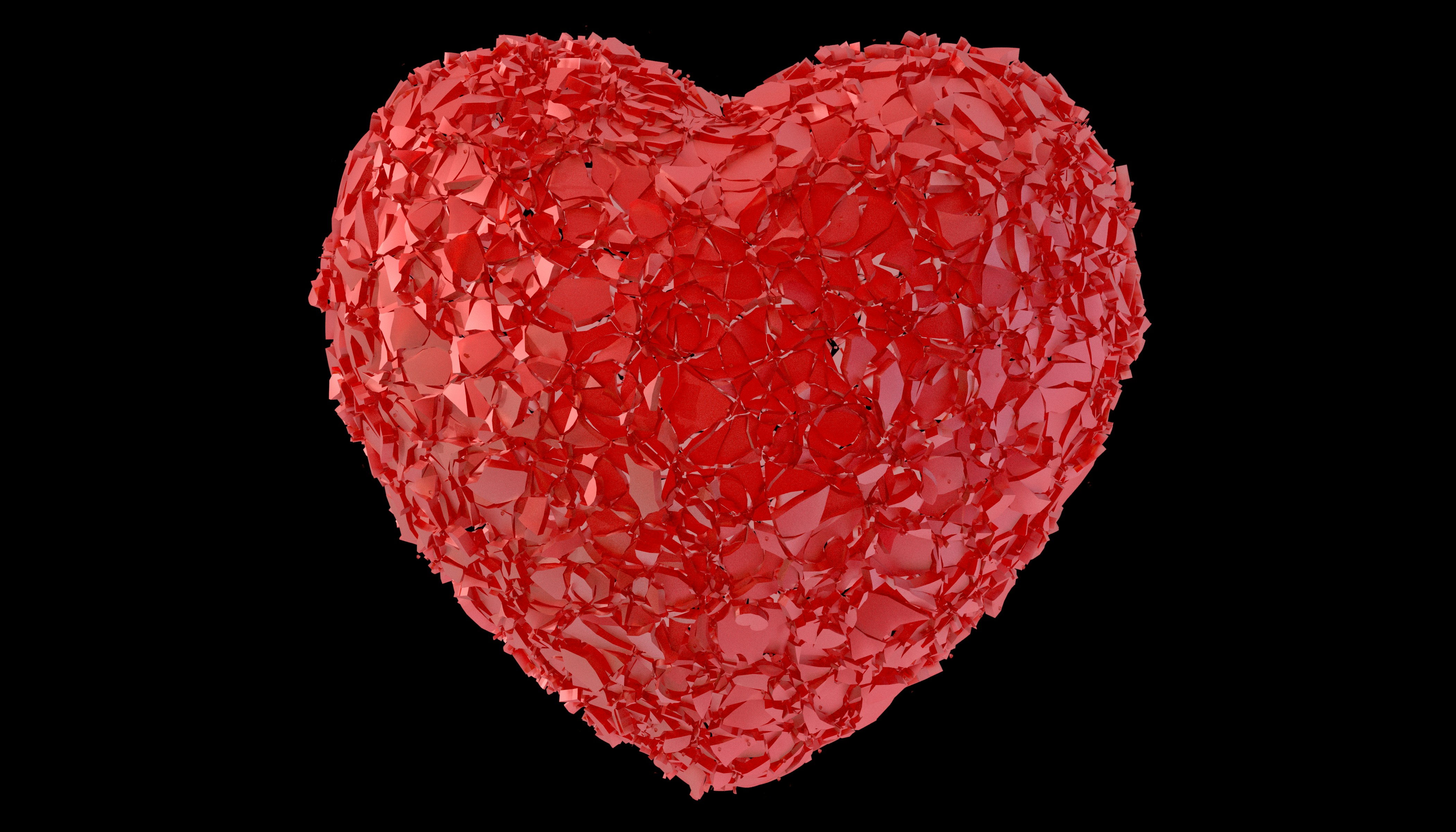 A red heart shaped object with a black background