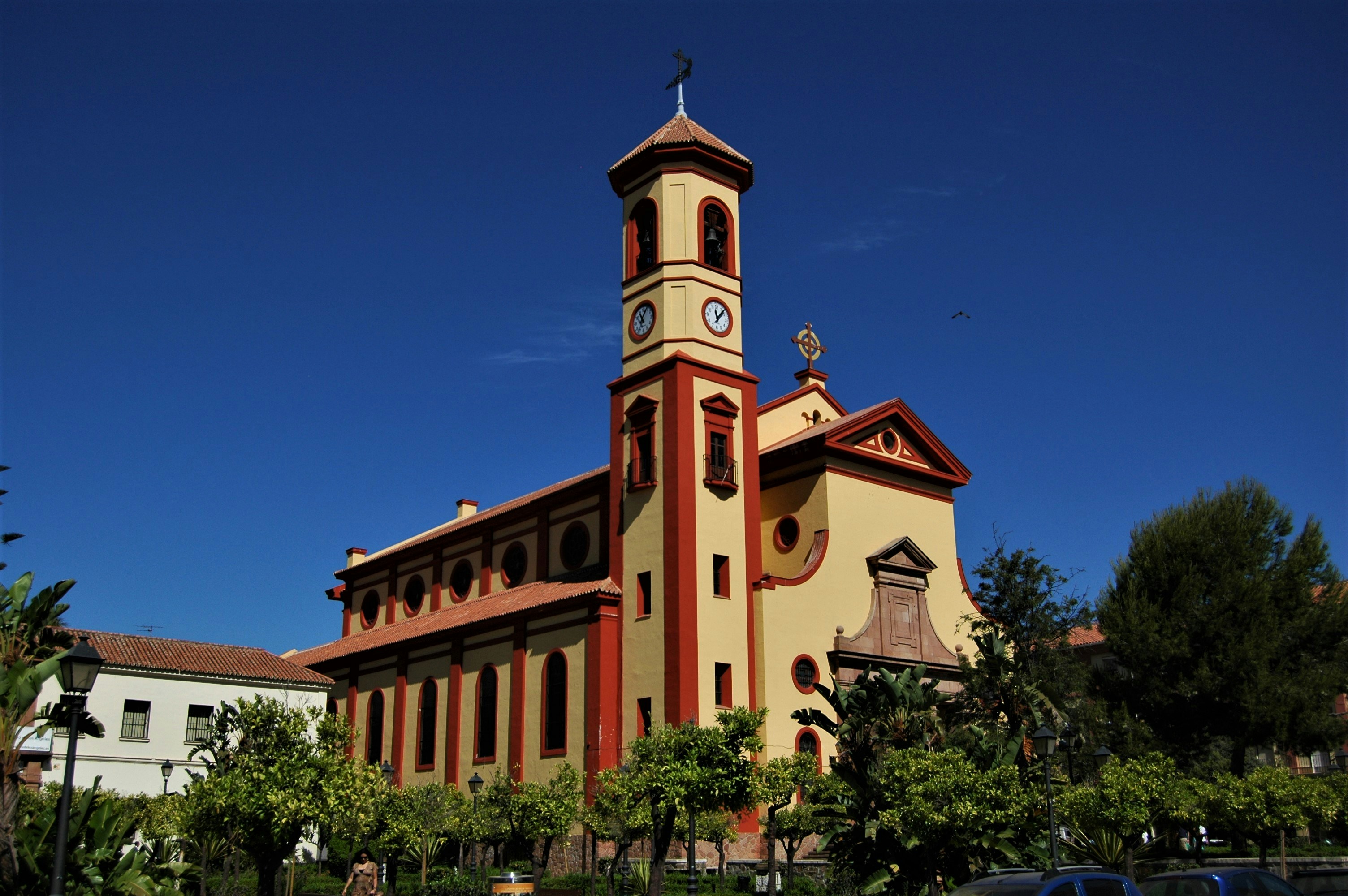 A large building with a clock on the top of it
