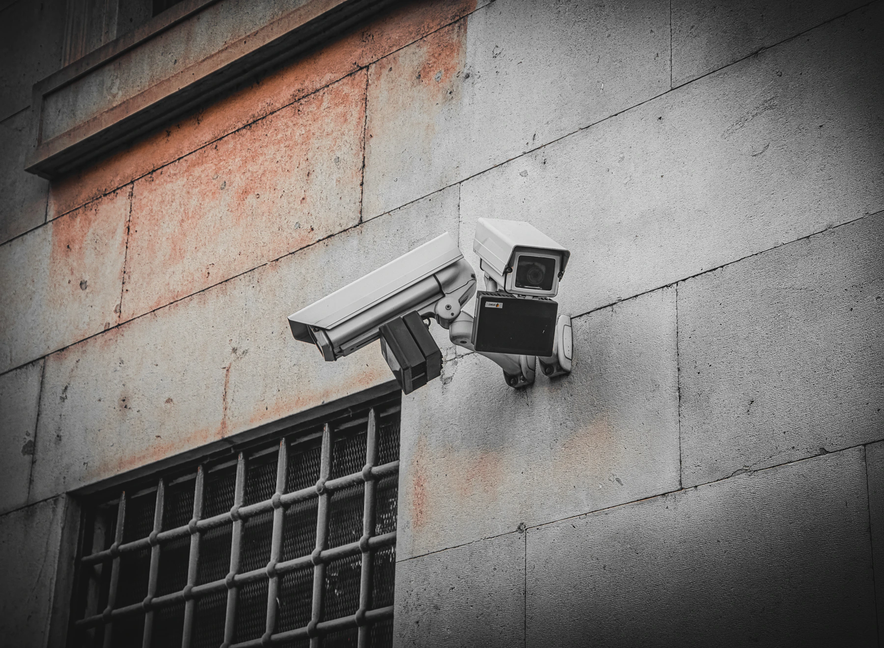 CCTV security cameras mounted on a commercial building