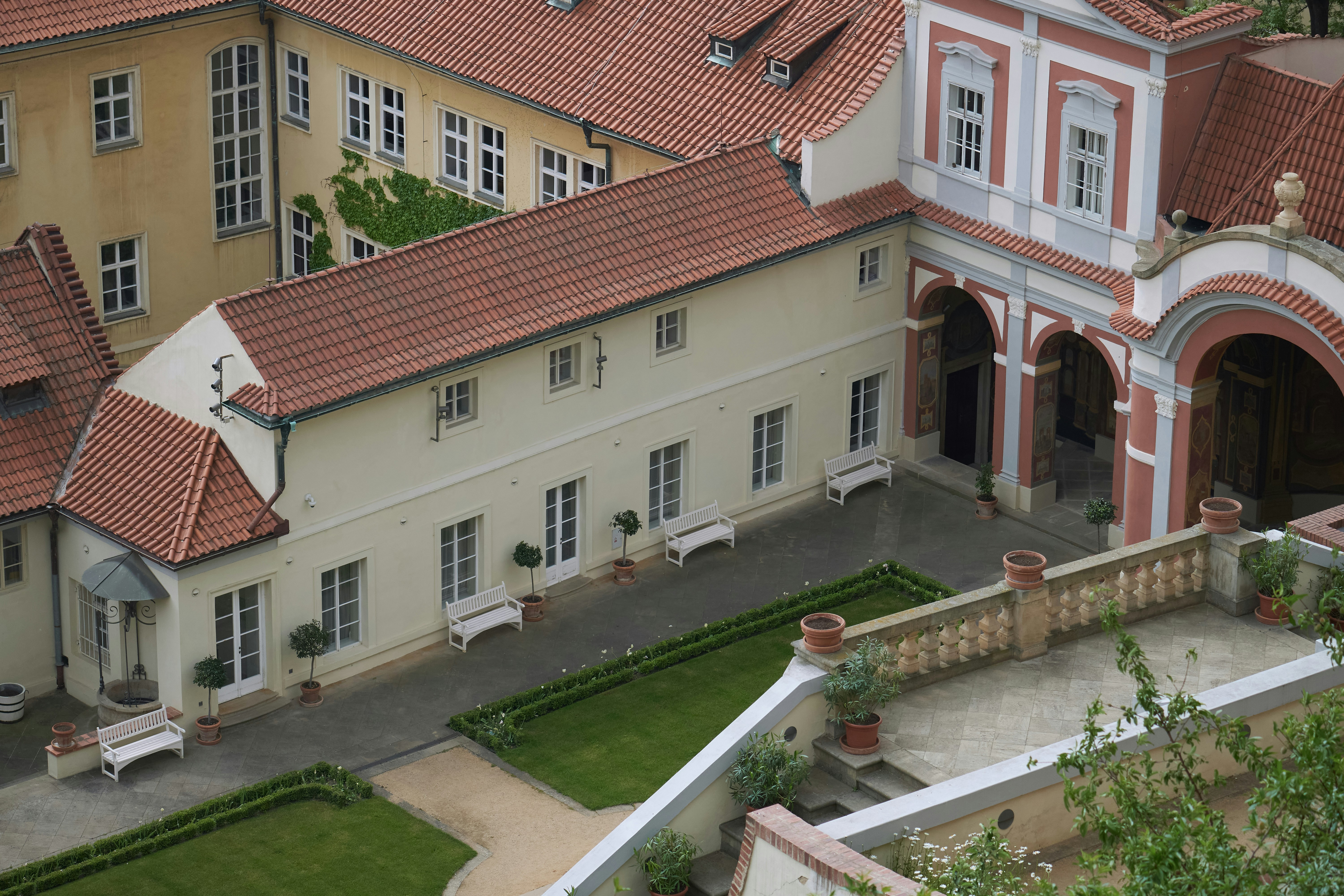 An aerial view of a large building with many windows
