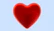 A red heart on a blue background