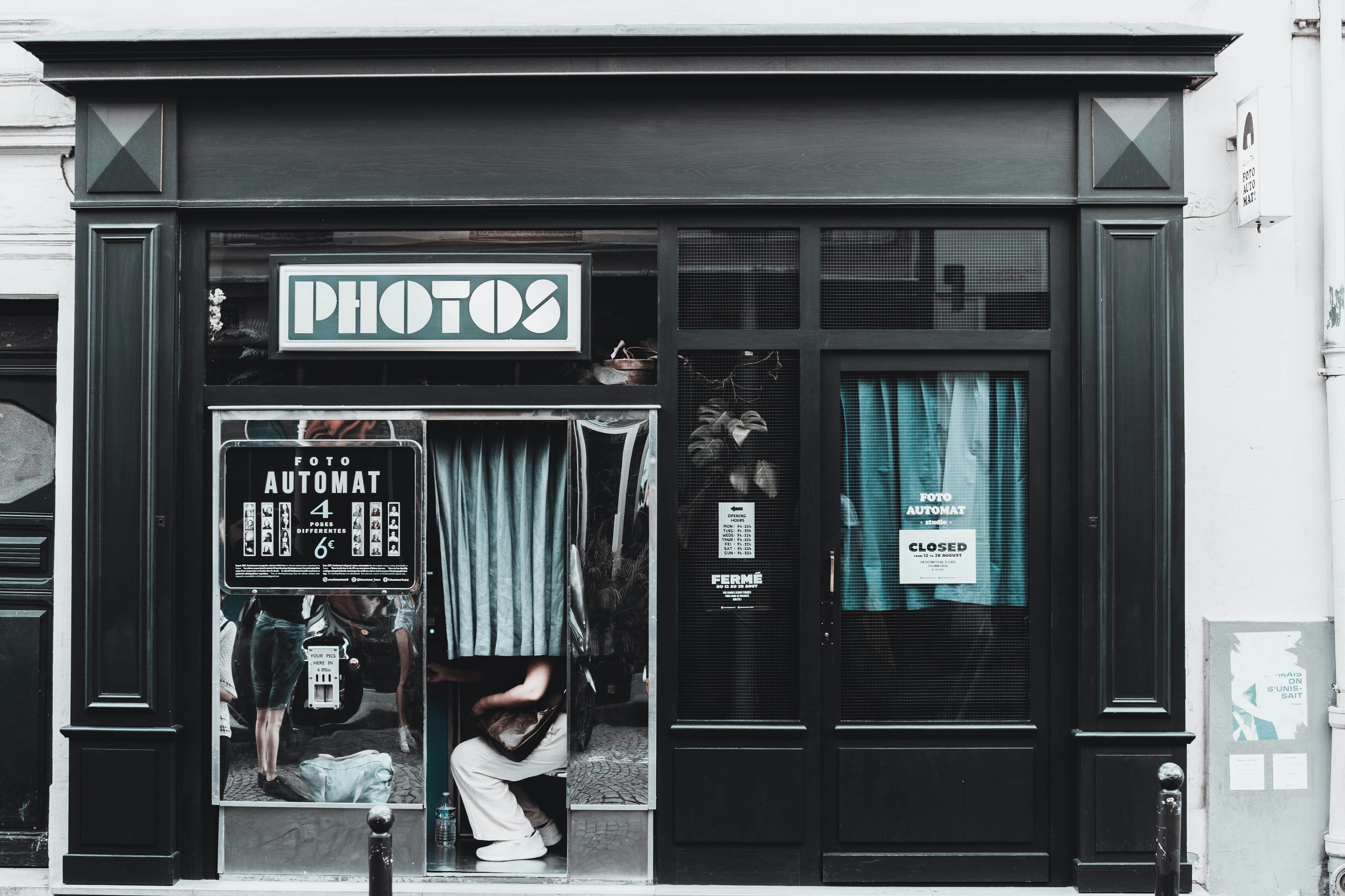 A black and white photo of a store front