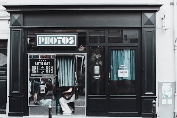 A black and white photo of a store front
