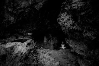 A black and white photo of a cave