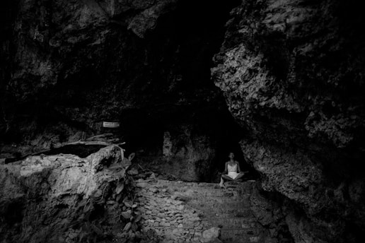 A black and white photo of a cave