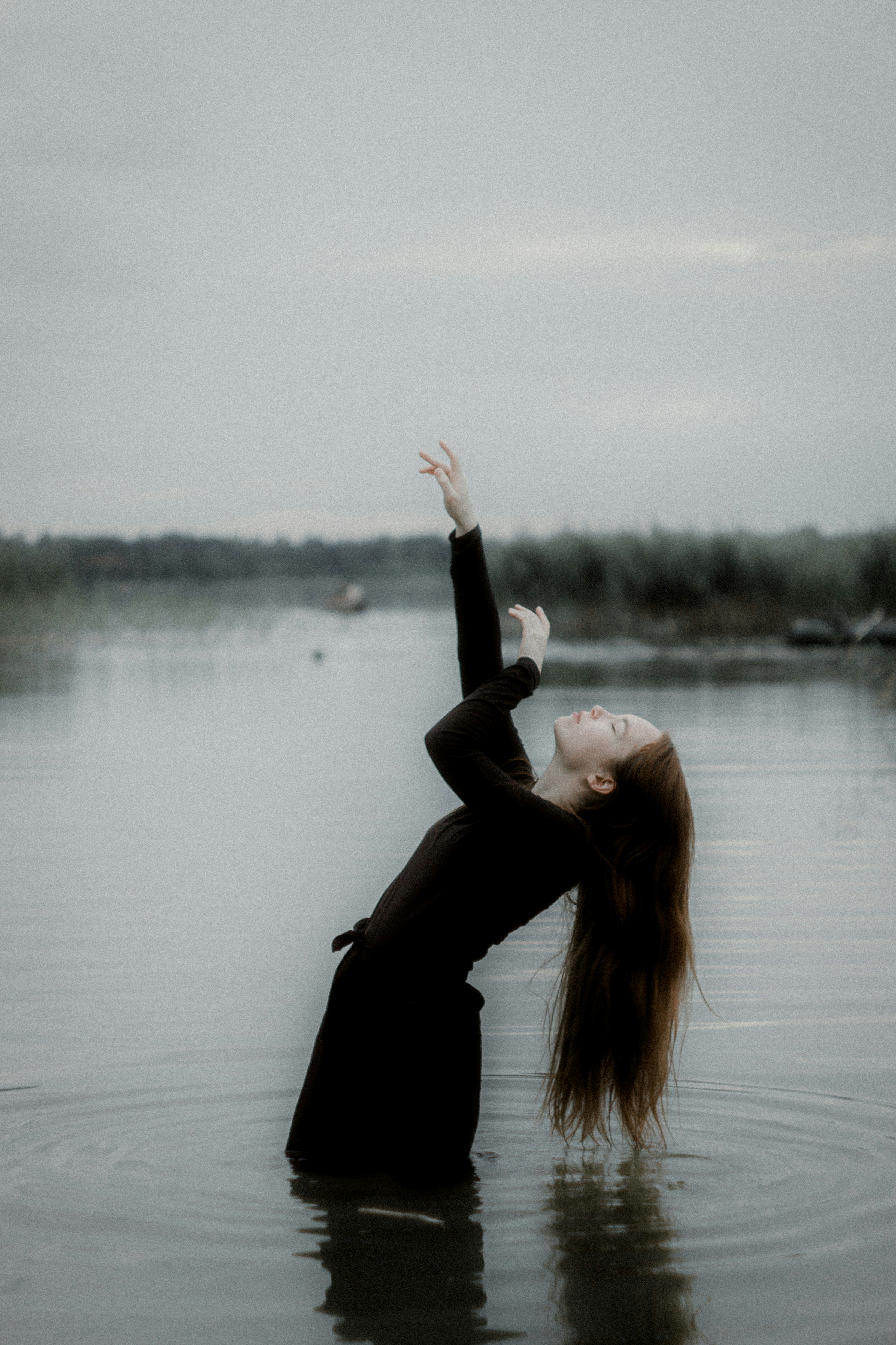 A woman standing in a body of water