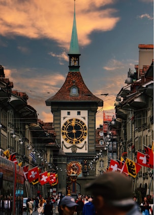 A large clock tower towering over a city street