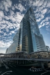 A very tall building sitting in the middle of a street