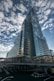 A very tall building sitting in the middle of a street