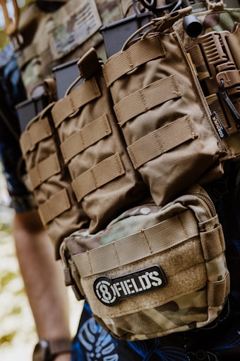A close up of a person wearing a vest