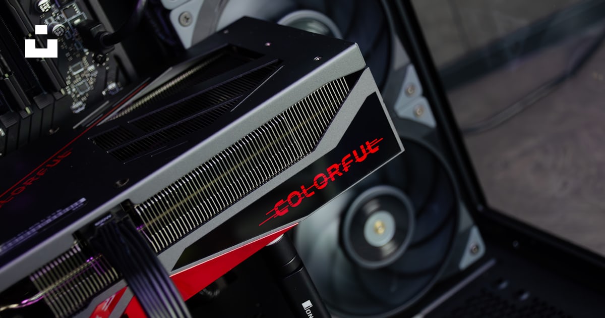 A close up of a computer with a red and black logo on it photo – Free ...
