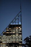 A very tall building lit up at night