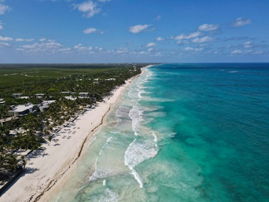 An aerial view of a beach and ocean — Tulum, Mexico