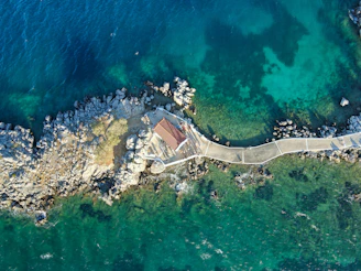An aerial view of a pier and the ocean