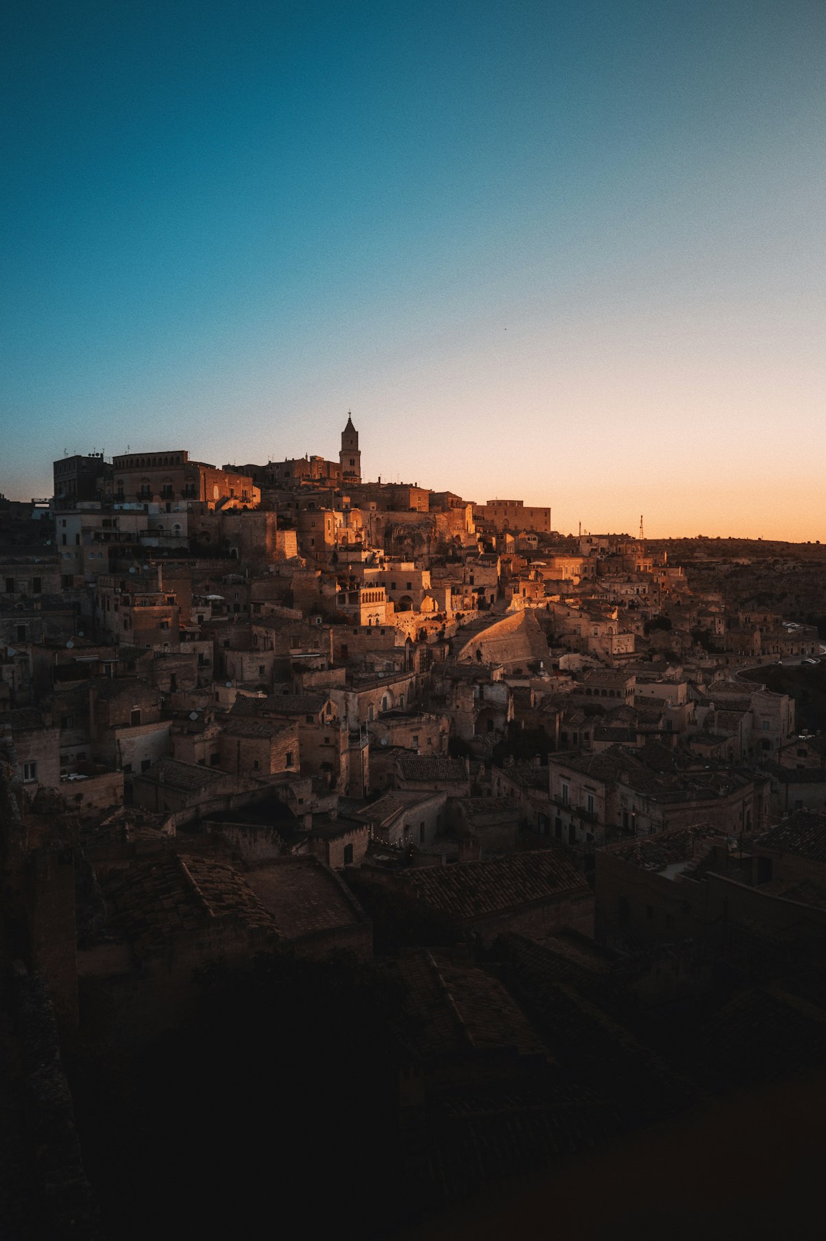 Ancient cave dwellings and stone houses of Matera at sunset
