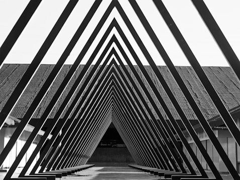 A black and white photo of a walkway