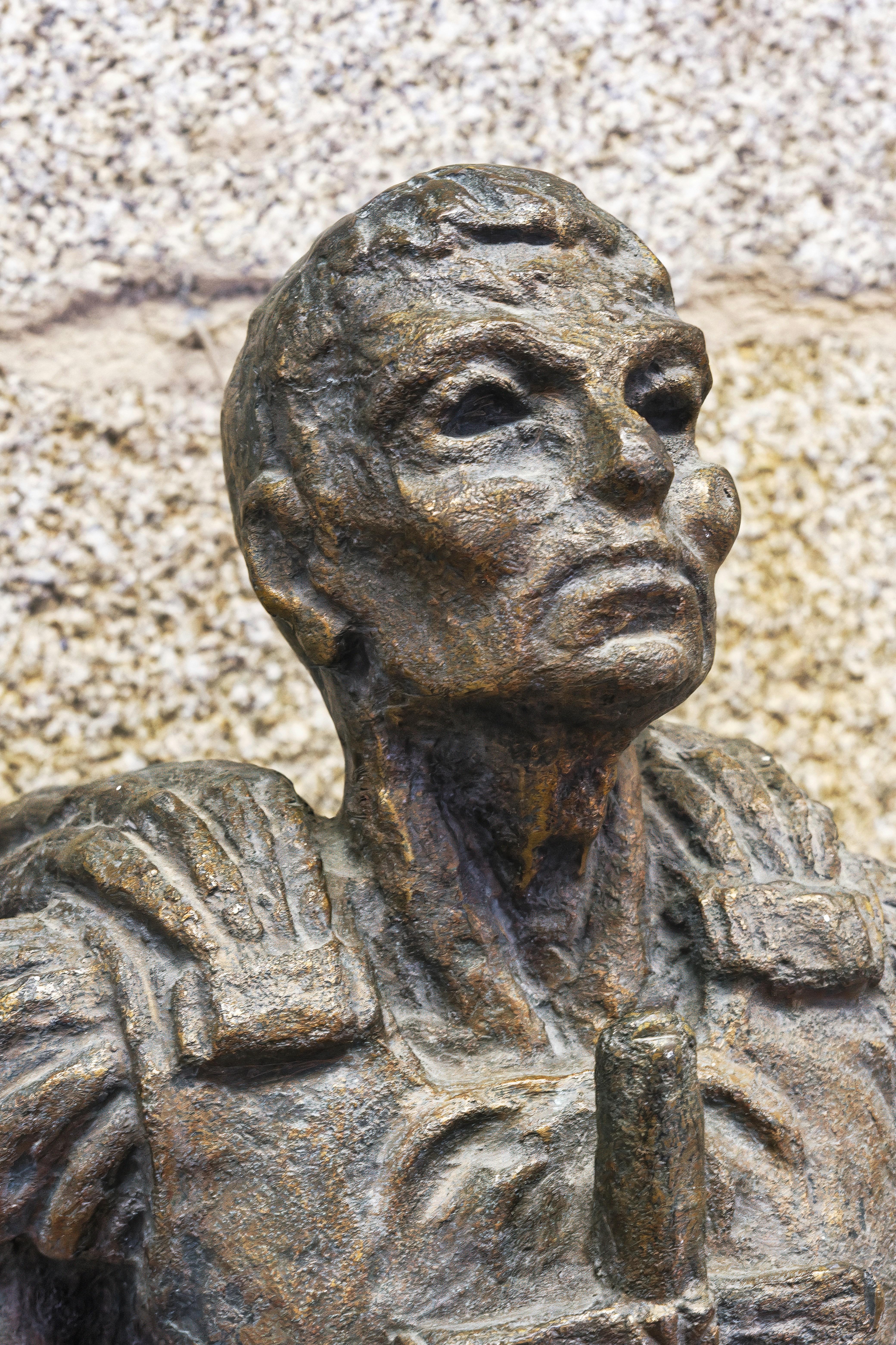 A close up of a statue of a man