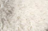 A pile of white rice sitting on top of a table