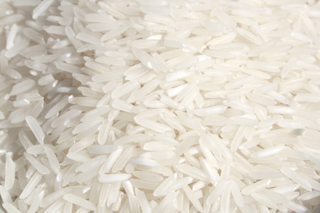 A pile of white rice sitting on top of a table