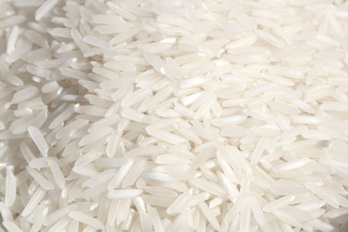 A pile of white rice sitting on top of a table