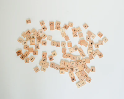 Wooden letters and printable cards laid out on a table