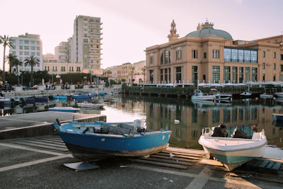 Fishing boats on the quay of Bari’s old harbour, the Teatro Margherita behind