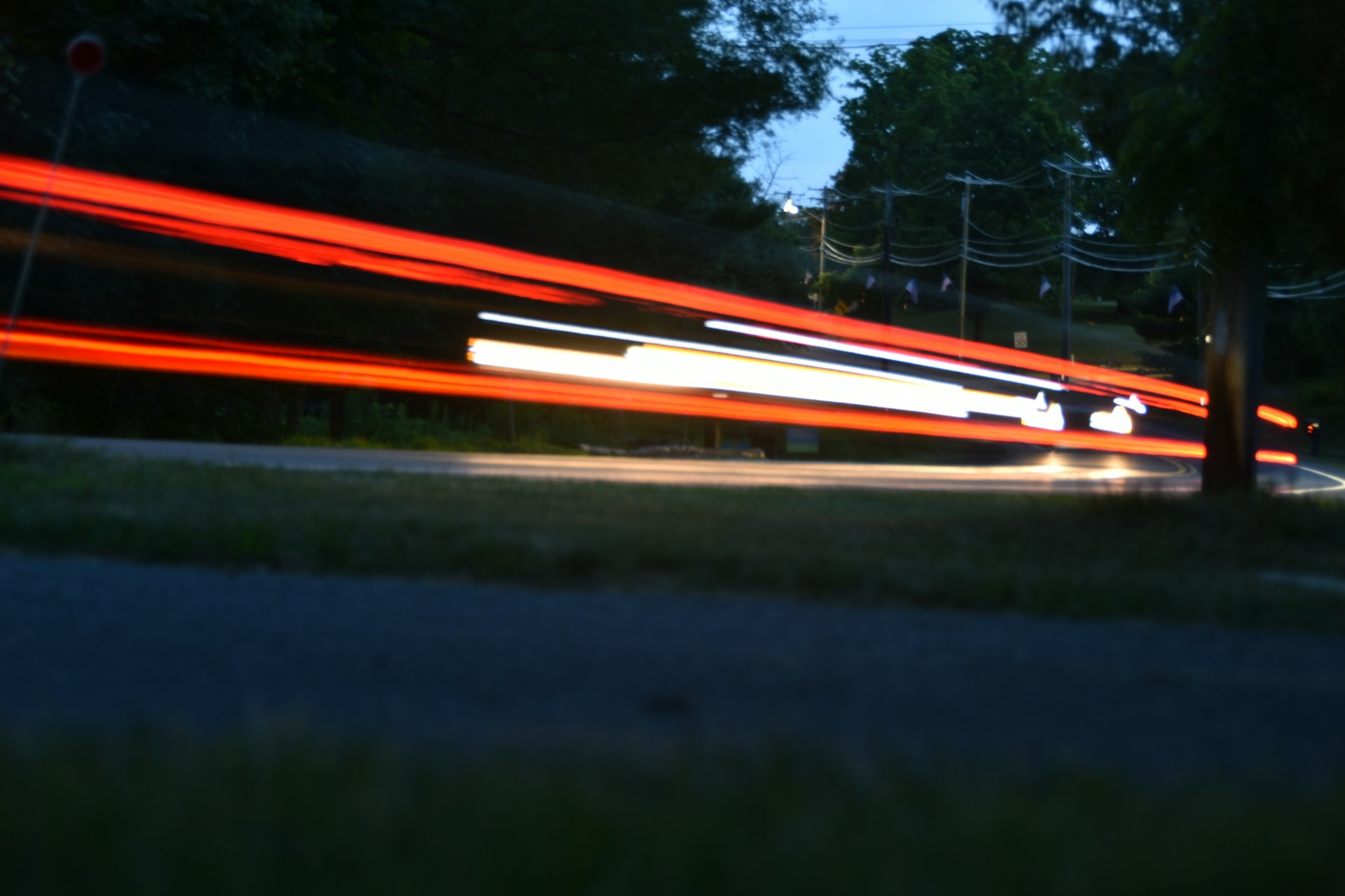 A blurry photo of a street at night