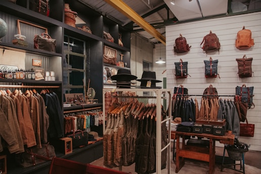 A clothing store with a lot of items on display