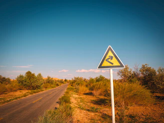 A road sign on the side of the road