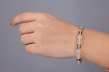 A woman's arm with a bracelet on it