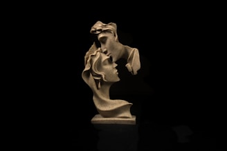 A statue of a woman with her mouth open