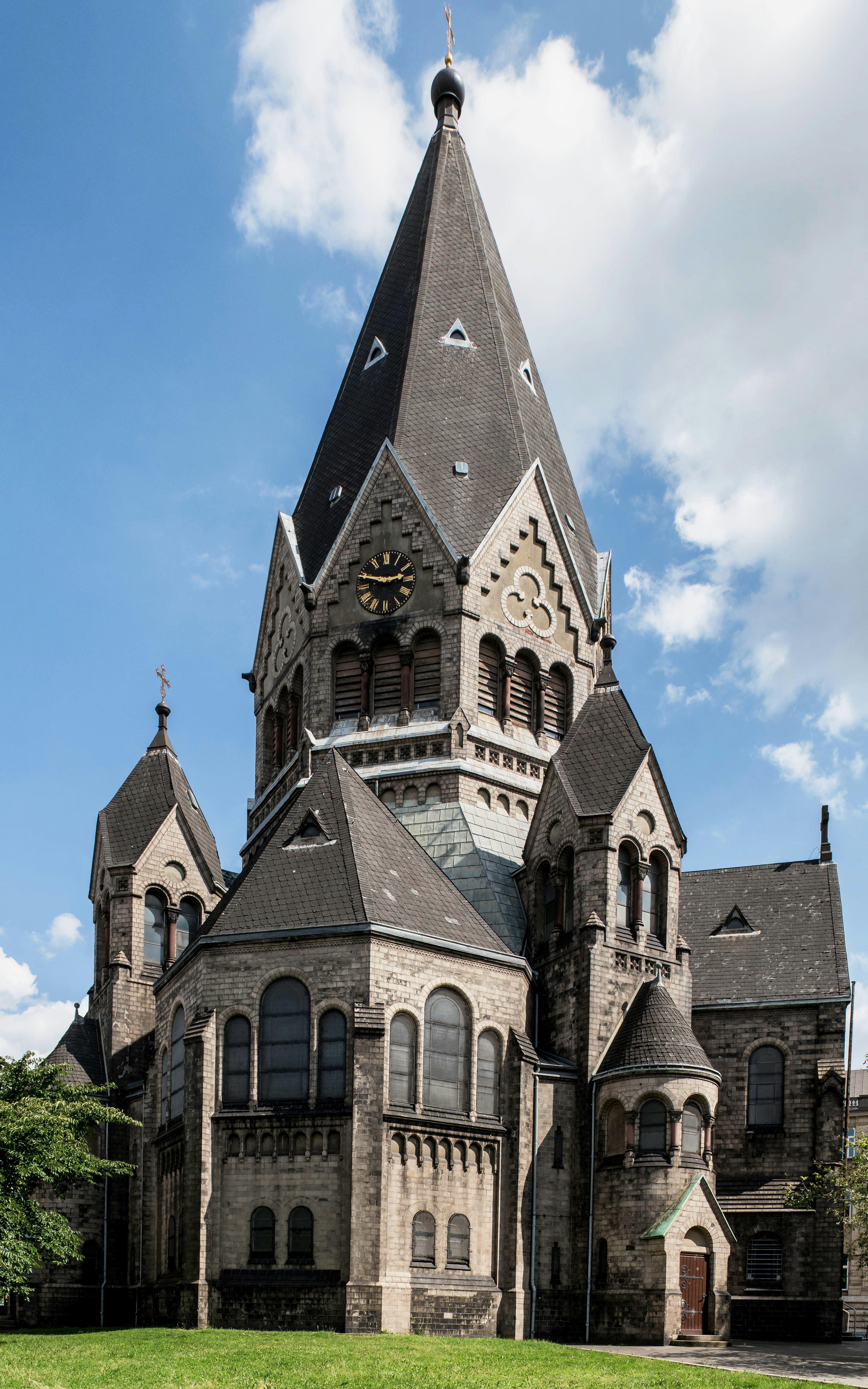 An old church with a steeple on a sunny day