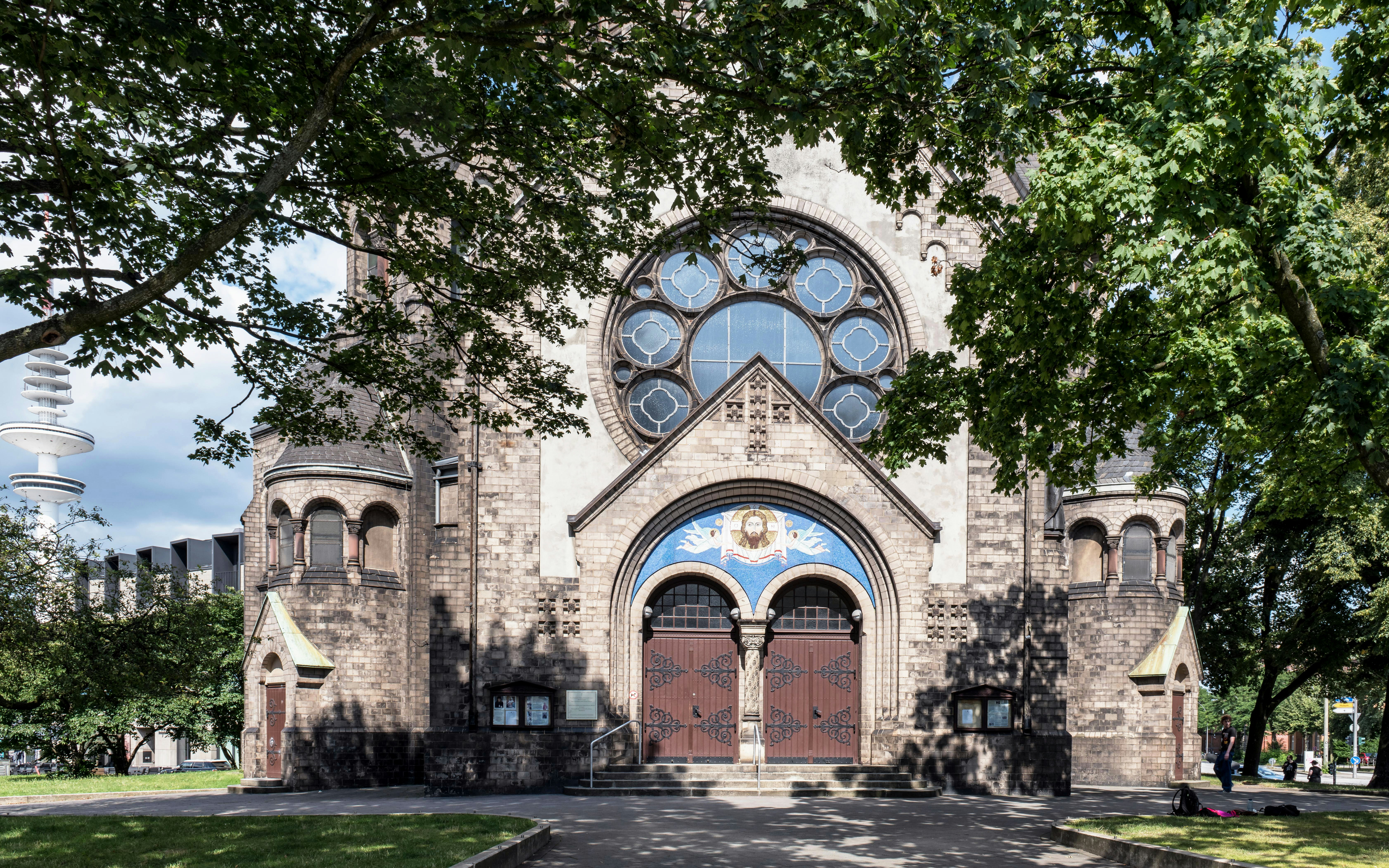 A large church with a massive stained glass window