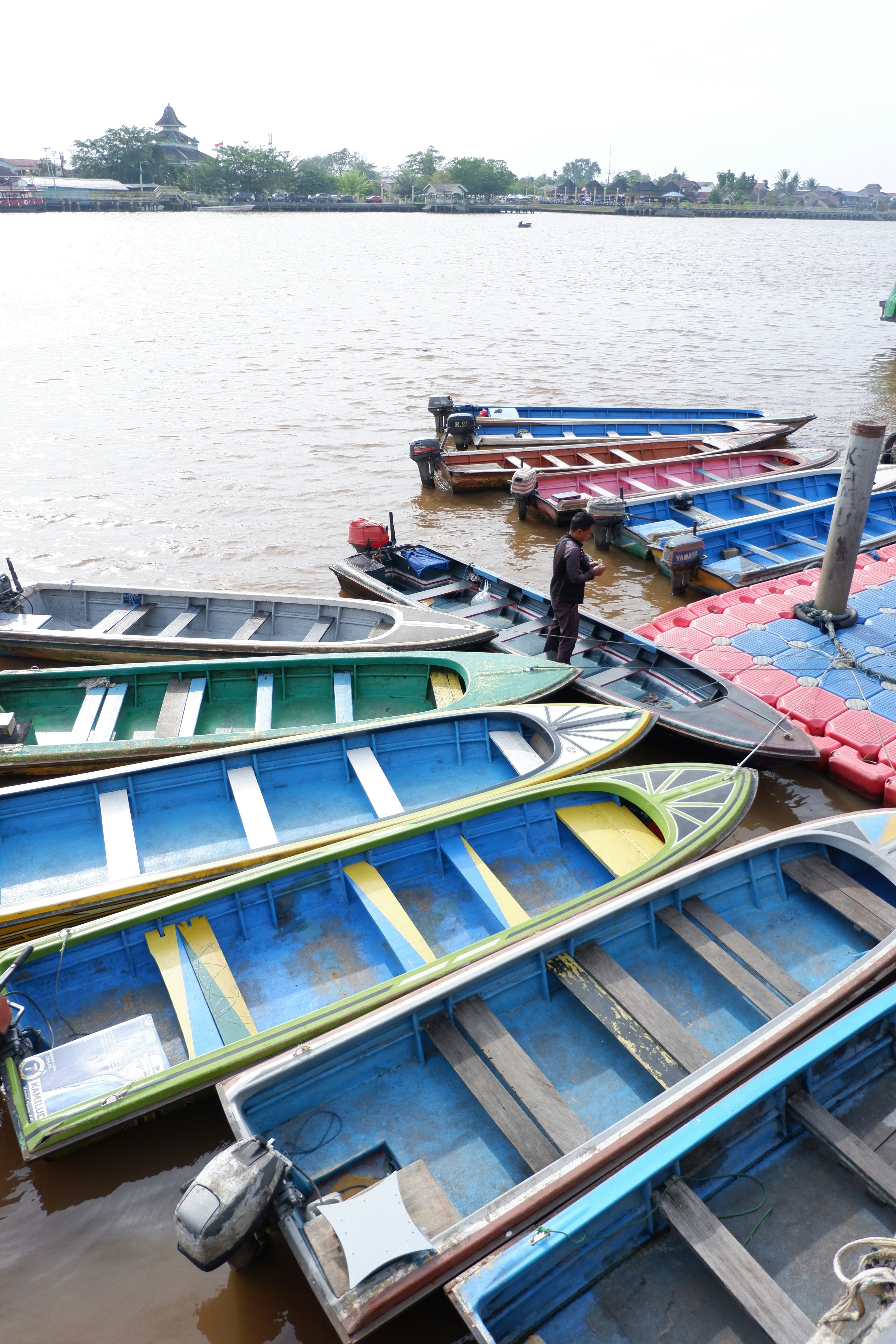 A bunch of boats that are sitting in the water