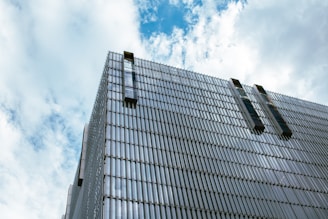 A tall building with a sky background