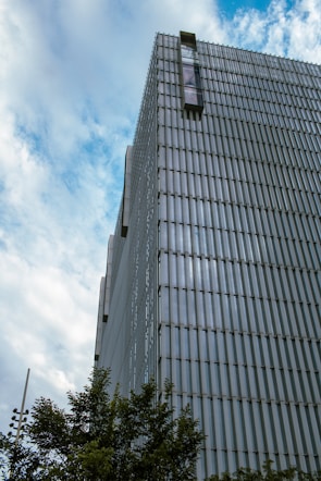 A tall building with a clock on the side of it