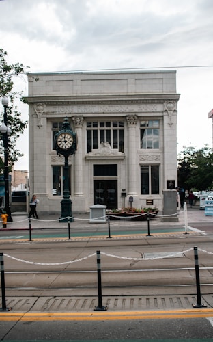 Historic building with clock representing the long timeline of central bank gold policy decisions