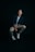 A man sitting on a chair in the dark