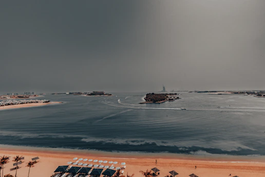 A view of a beach with a boat in the water