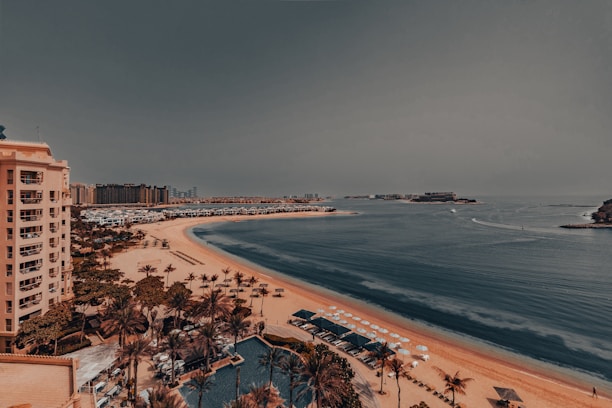 An aerial view of a beach and a city