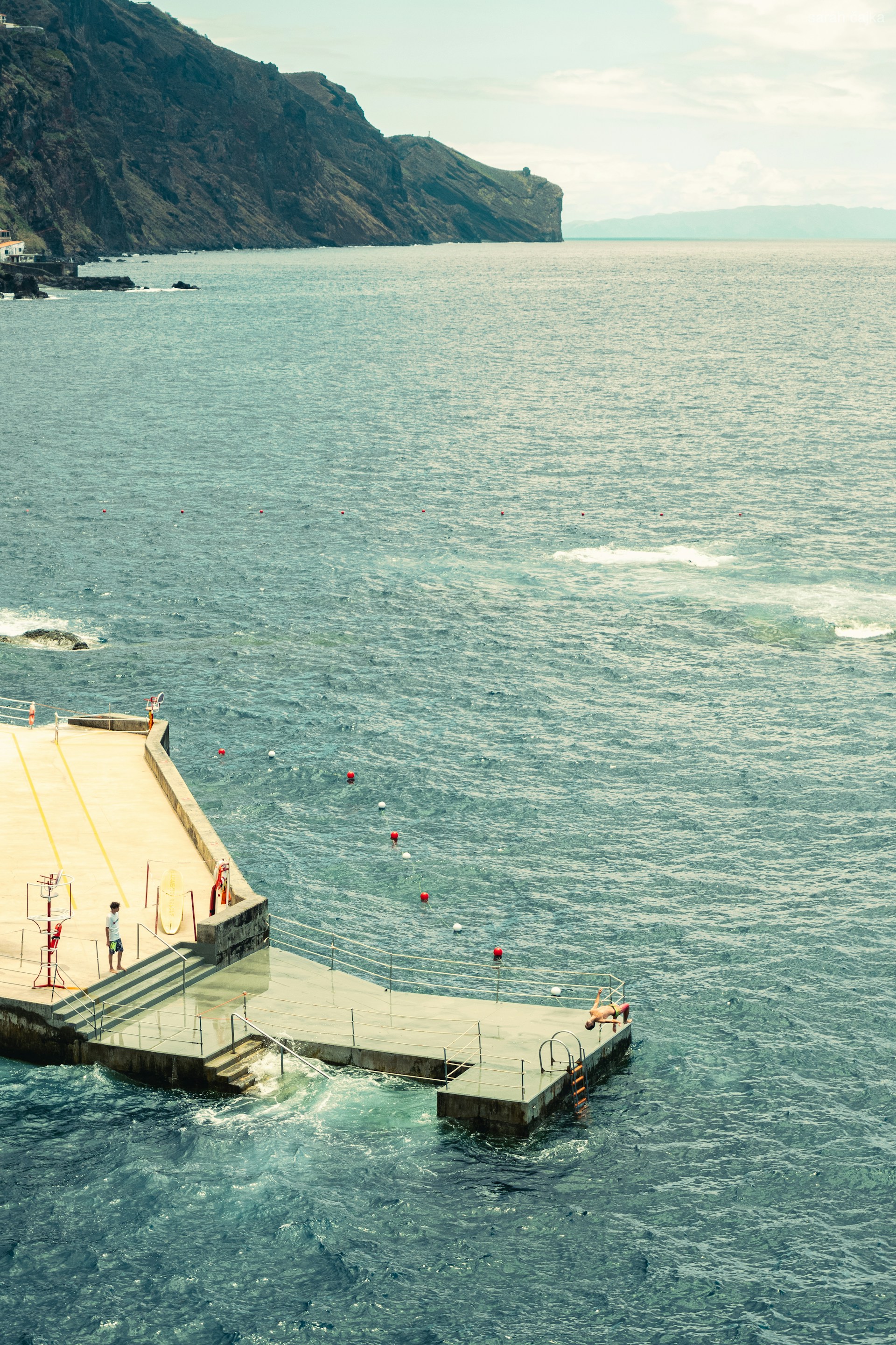 A large body of water with a boat in it