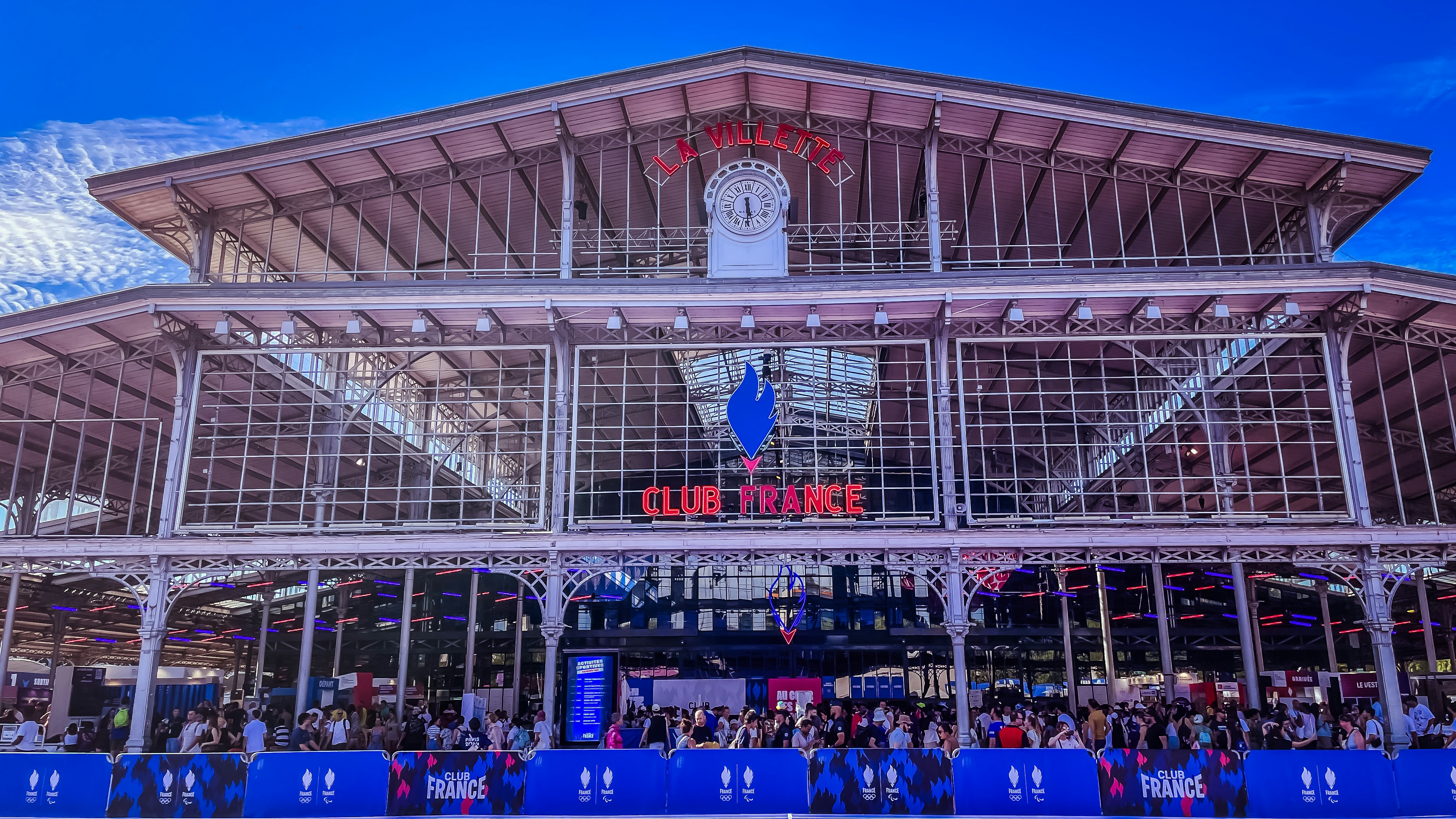 A large building with a lot of people inside of it