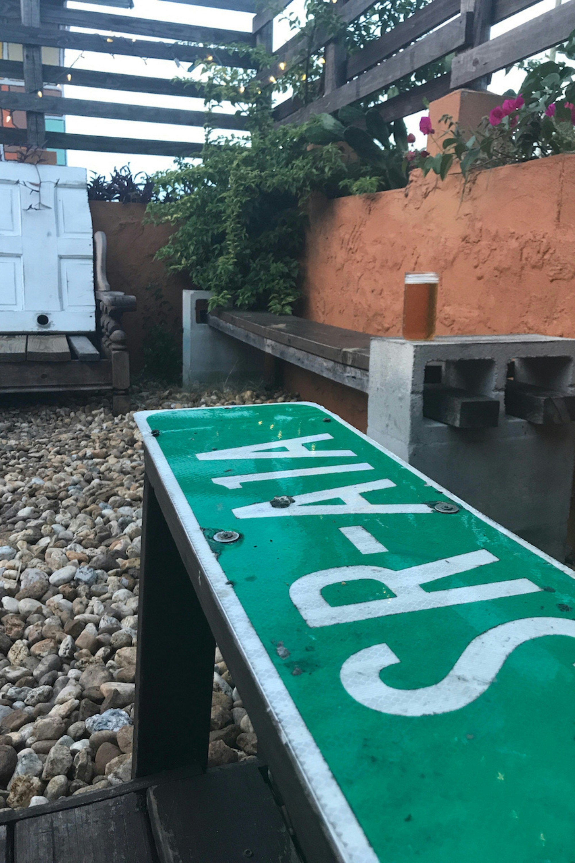 Local business owner placing a yard sign outside their store