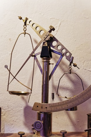 A large metal object sitting on top of a wooden table