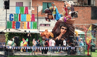 A carnival float with a man dressed as a lion