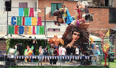 A carnival float with a man dressed as a lion