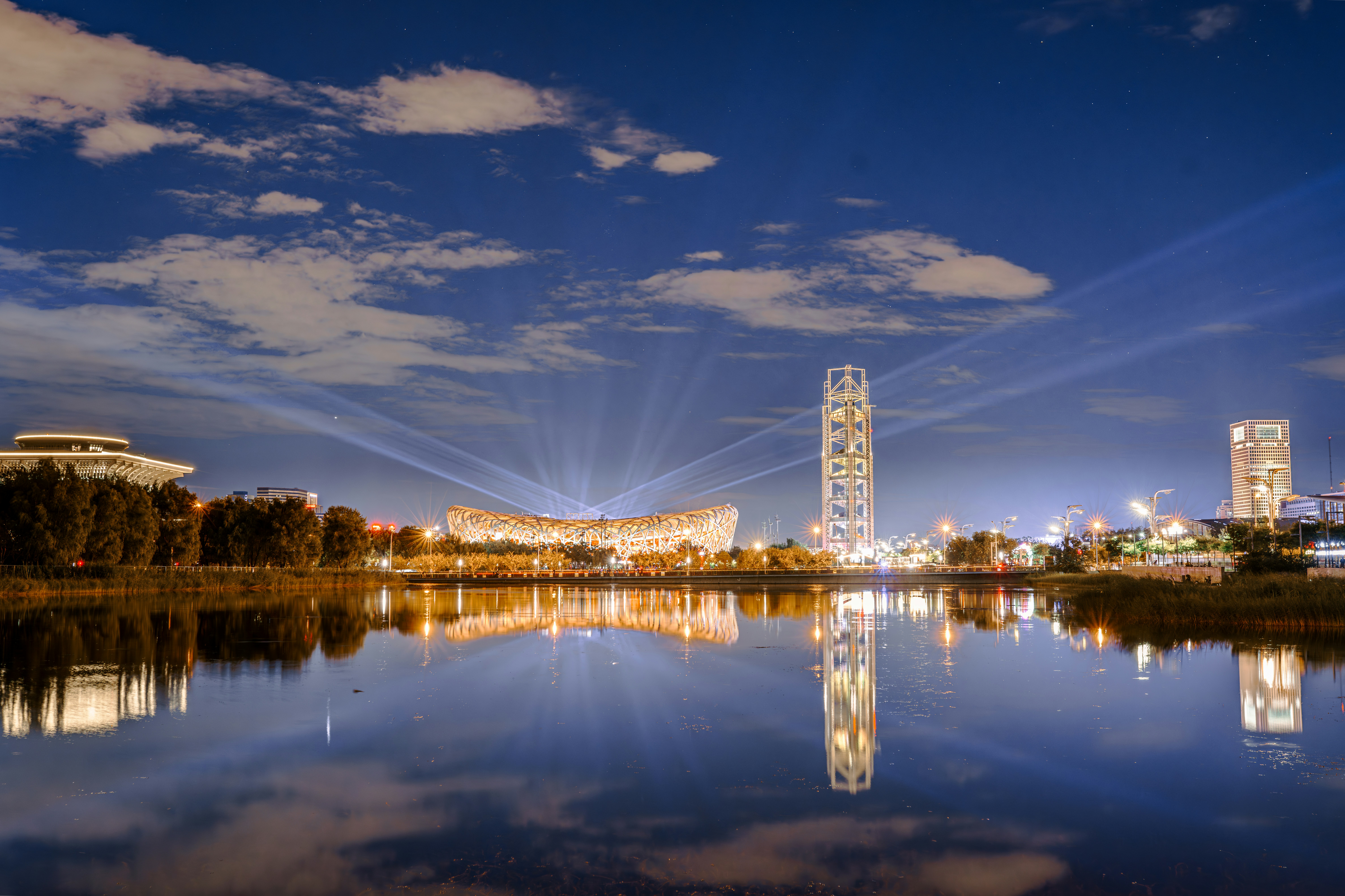 A large body of water surrounded by tall buildings